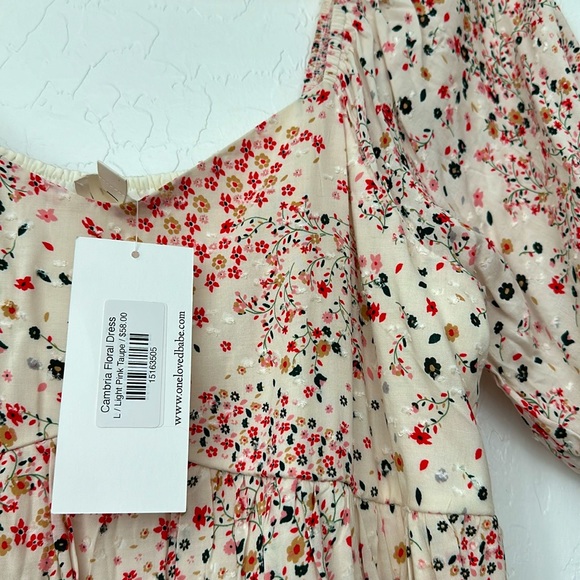 Floral knee length dress. Perfect for spring! New with tags. - Picture 3 of 4